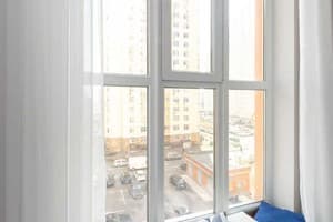 в новом доме на Оболони 11